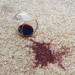 43929743 — glass of red wine fell on carpet, wine spilled on carpet